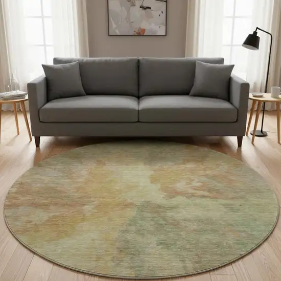 8' Artichoke Green Gold And Copper Abstract Washable Round Rug With UV Protection Photo 2