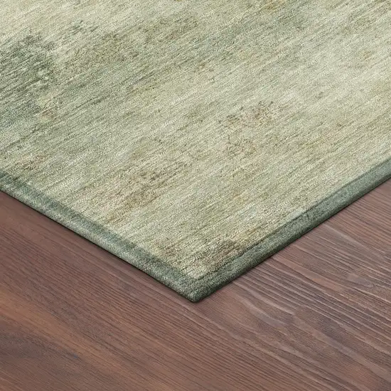 8' Artichoke Green Gold And Ivory Round Abstract Washable Indoor Outdoor Area Rug Photo 7