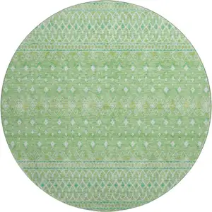 Photo of 8' Artichoke Green Gold And Ivory Tribal Washable Round Rug With UV Protection