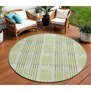 Photo of 8' Artichoke Green Gray And Brown Round Plaid Washable Indoor Outdoor Area Rug