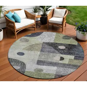 Photo of 8' Artichoke Green Gray And Charcoal Round Geometric Washable Indoor Outdoor Area Rug