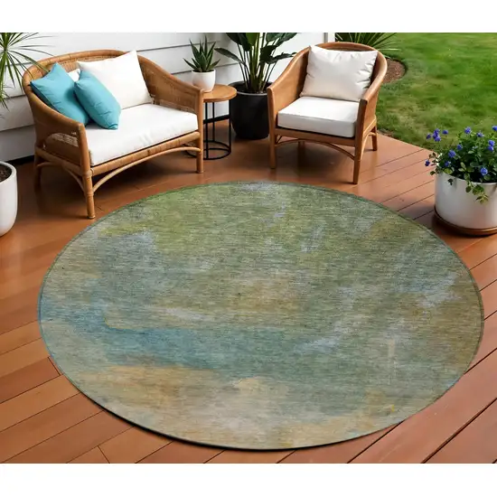 8' Artichoke Green Gray And Gold Round Abstract Washable Indoor Outdoor Area Rug Photo 1