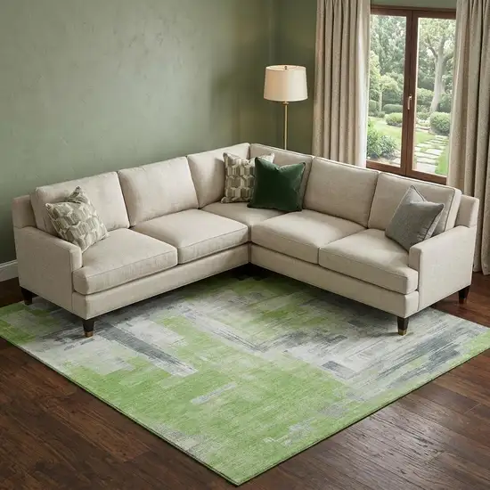 8' Artichoke Green Gray And Ivory Abstract Washable Area Rug With UV Protection Photo 1