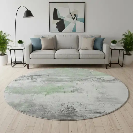 8' Artichoke Green Gray And Ivory Abstract Washable Round Rug With UV Protection Photo 2
