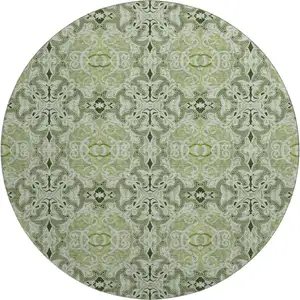 Photo of 8' Artichoke Green Gray And Ivory Medallion Washable Round Rug With UV Protection