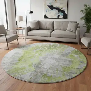 Photo of 8' Artichoke Green Gray And Silver Abstract Washable Round Rug With UV Protection