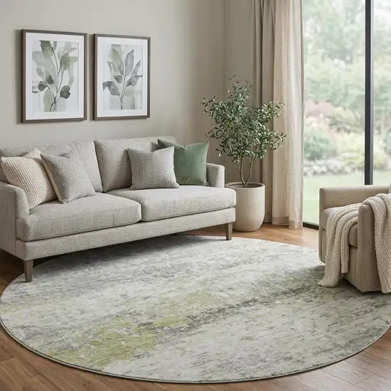 8' Artichoke Green Gray And Silver Abstract Washable Round Rug With UV Protection Photo 1