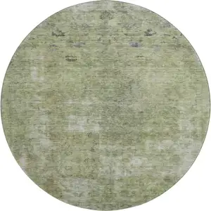 Photo of 8' Artichoke Green Gray And Silver Abstract Washable Round Rug With UV Protection