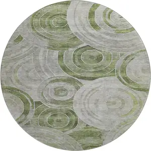 Photo of 8' Artichoke Green Gray And Silver Geometric Washable Round Rug With UV Protection