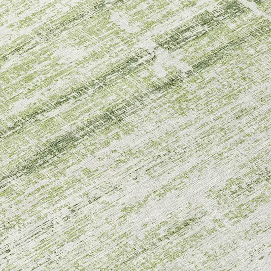 8' Artichoke Green Green And Ivory Round Abstract Washable Indoor Outdoor Area Rug Photo 9