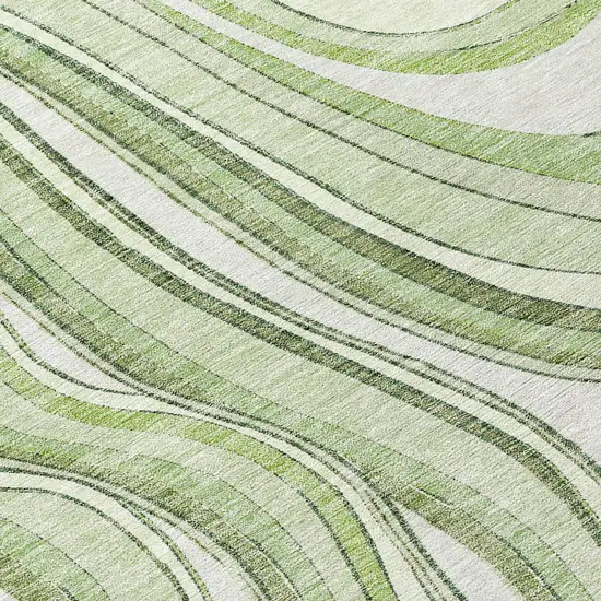 8' Artichoke Green Green And Ivory Round Abstract Washable Indoor Outdoor Area Rug Photo 9