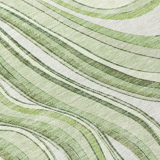 8' Artichoke Green Green And Ivory Round Abstract Washable Indoor Outdoor Area Rug Photo 9