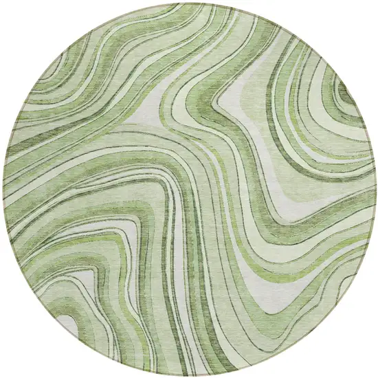 8' Artichoke Green Green And Ivory Round Abstract Washable Indoor Outdoor Area Rug Photo 1