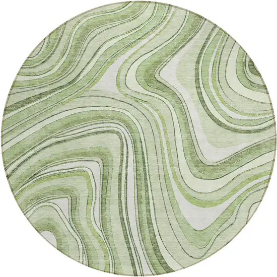 8' Artichoke Green Green And Ivory Round Abstract Washable Indoor Outdoor Area Rug Photo 1