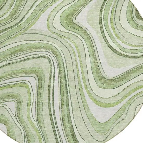 8' Artichoke Green Green And Ivory Round Abstract Washable Indoor Outdoor Area Rug Photo 4