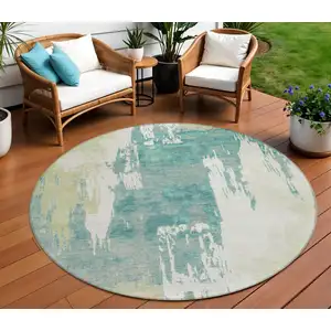 Photo of 8' Artichoke Green Ivory And Aqua Round Abstract Washable Indoor Outdoor Area Rug