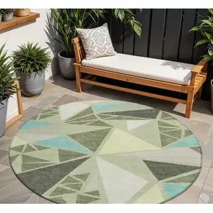 Photo of 8' Artichoke Green Ivory And Aqua Round Geometric Washable Indoor Outdoor Area Rug