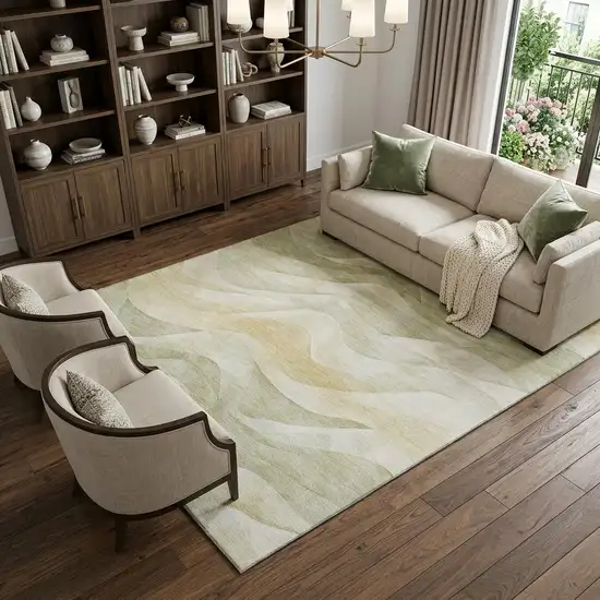 8' Artichoke Green Ivory And Beige Abstract Washable Area Rug With UV Protection Photo 1