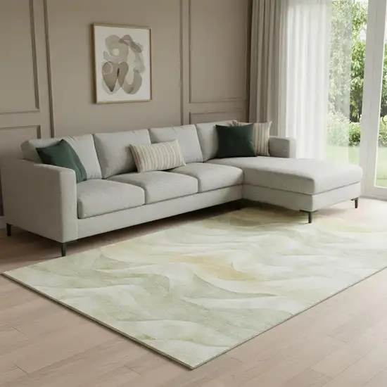 8' Artichoke Green Ivory And Beige Abstract Washable Area Rug With UV Protection Photo 2
