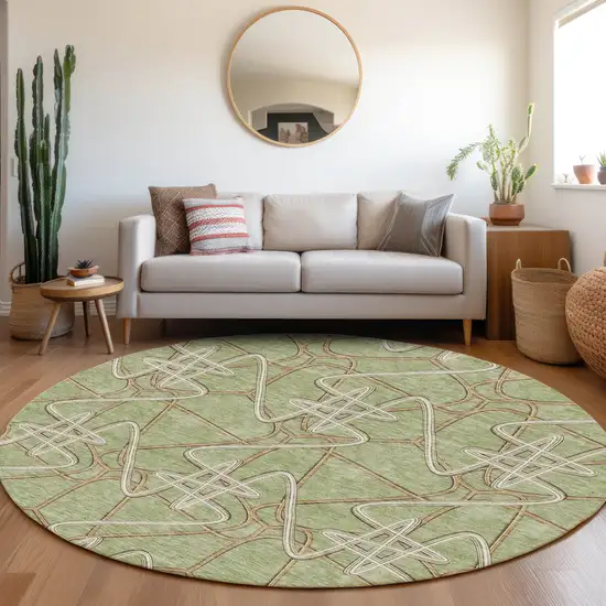 8' Artichoke Green Ivory And Beige Geometric Washable Round Rug With UV Protection Photo 4