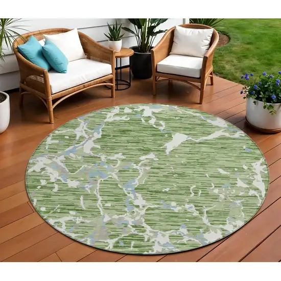 8' Artichoke Green Ivory And Beige Round Striped Washable Indoor Outdoor Area Rug Photo 1