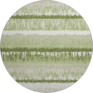 Photo of 8' Artichoke Green Ivory And Beige Striped Washable Round Rug With UV Protection