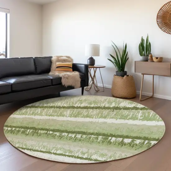 8' Artichoke Green Ivory And Beige Striped Washable Round Rug With UV Protection Photo 4