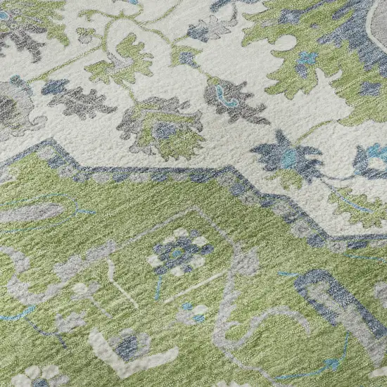 8' Artichoke Green Ivory And Blue Oriental Washable Round Rug With UV Protection Photo 8