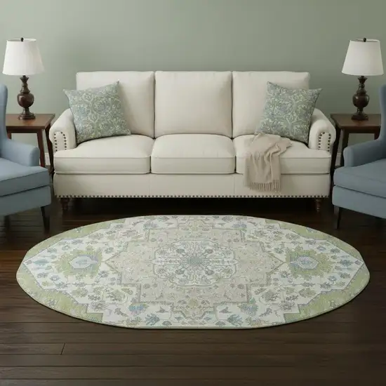 8' Artichoke Green Ivory And Blue Oriental Washable Round Rug With UV Protection Photo 2