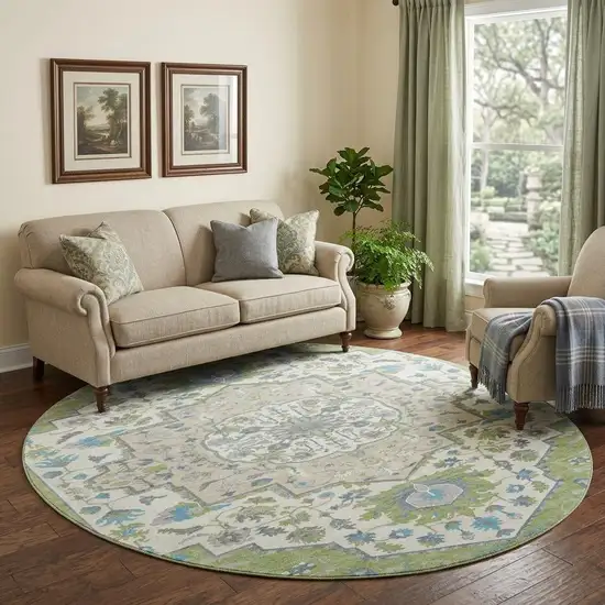 8' Artichoke Green Ivory And Blue Oriental Washable Round Rug With UV Protection Photo 1