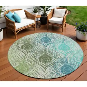 Photo of 8' Artichoke Green Ivory And Blue Round Floral Washable Indoor Outdoor Area Rug
