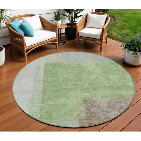 8' Artichoke Green Ivory And Brown Round Abstract Washable Indoor Outdoor Area Rug Photo 1