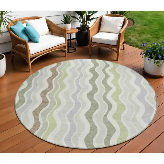 8' Artichoke Green Ivory And Brown Round Striped Washable Indoor Outdoor Area Rug Photo 1