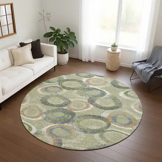 8' Artichoke Green Ivory And Copper Round Geometric Washable Indoor Outdoor Area Rug Photo 9