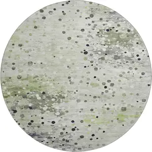 Photo of 8' Artichoke Green Ivory And Gray Abstract Washable Round Rug With UV Protection