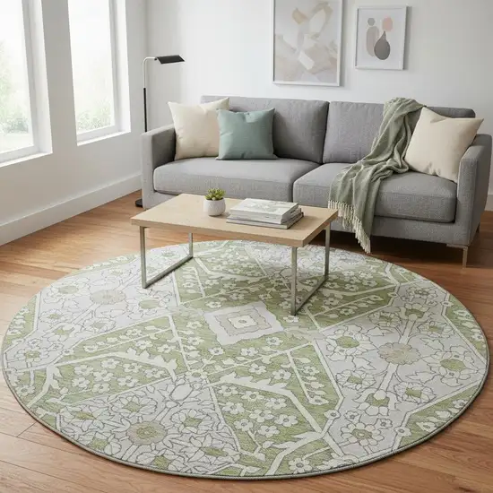 8' Artichoke Green Ivory And Gray Floral Washable Round Rug With UV Protection Photo 1