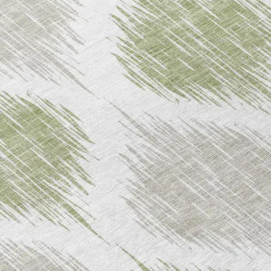 8' Artichoke Green Ivory And Gray Round Ikat Washable Indoor Outdoor Area Rug Photo 9