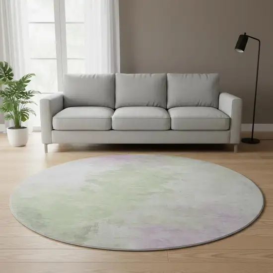 8' Artichoke Green Ivory And Lavender Abstract Washable Round Rug With UV Protection Photo 2