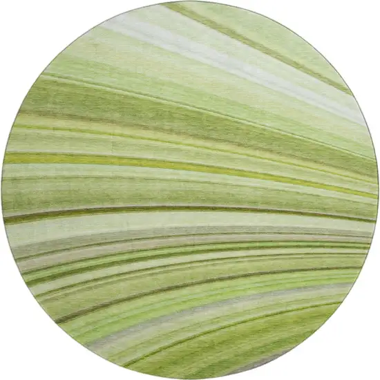 8' Artichoke Green Ivory And Purple Abstract Washable Round Rug With UV Protection Photo 1