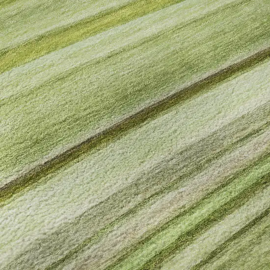 8' Artichoke Green Ivory And Purple Abstract Washable Round Rug With UV Protection Photo 8