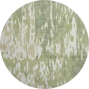 Photo of 8' Artichoke Green Ivory And Taupe Abstract Washable Round Rug With UV Protection
