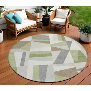 Photo of 8' Artichoke Green Ivory And Taupe Round Geometric Washable Indoor Outdoor Area Rug