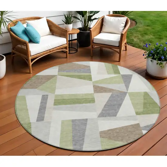 8' Artichoke Green Ivory And Taupe Round Geometric Washable Indoor Outdoor Area Rug Photo 1