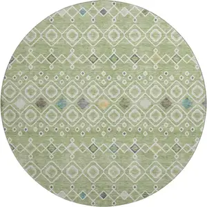 Photo of 8' Artichoke Green Ivory And Teal Southwestern Washable Round Rug With UV Protection