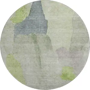 Photo of 8' Artichoke Green Lavender And Taupe Abstract Washable Round Rug With UV Protection