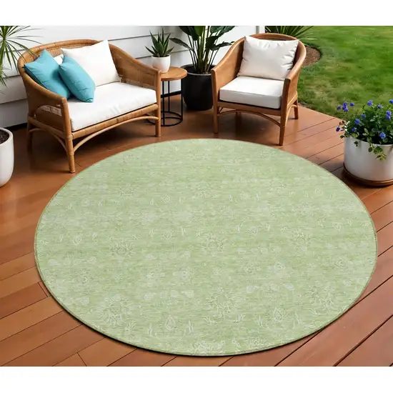 8' Artichoke Green Mint Green And Ivory Round Floral Washable Indoor Outdoor Area Rug Photo 1