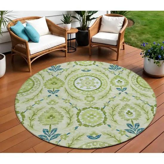 8' Artichoke Green Olive Green And Blue Round Floral Washable Indoor Outdoor Area Rug Photo 1