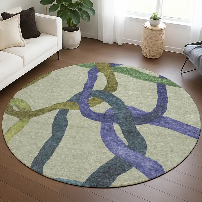 8' Artichoke Green Purple And Khaki Round Abstract Washable Indoor Outdoor Area Rug Photo 5