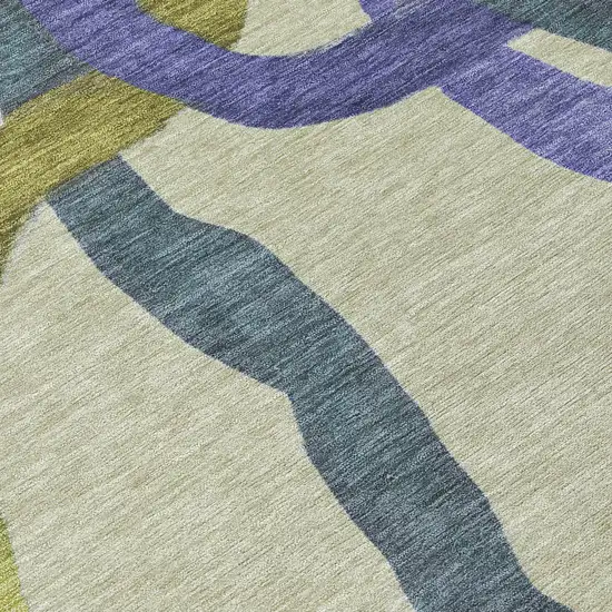 8' Artichoke Green Purple And Khaki Round Abstract Washable Indoor Outdoor Area Rug Photo 9