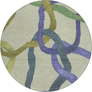 Photo of 8' Artichoke Green Purple And Khaki Round Abstract Washable Indoor Outdoor Area Rug